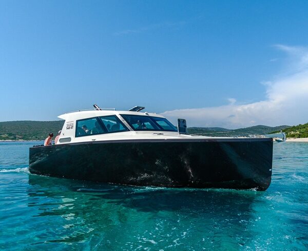 Brown-white luxury speed boat, 40 feet in Adriatic sea.