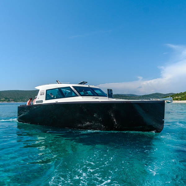 Brown-white luxury speed boat, 40 feet in Adriatic sea.